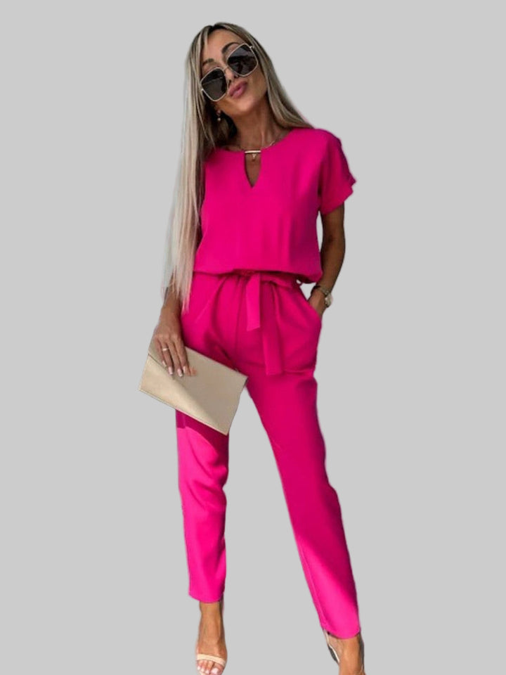 Dames jumpsuit met V-hals ceintuur en korte mouwen