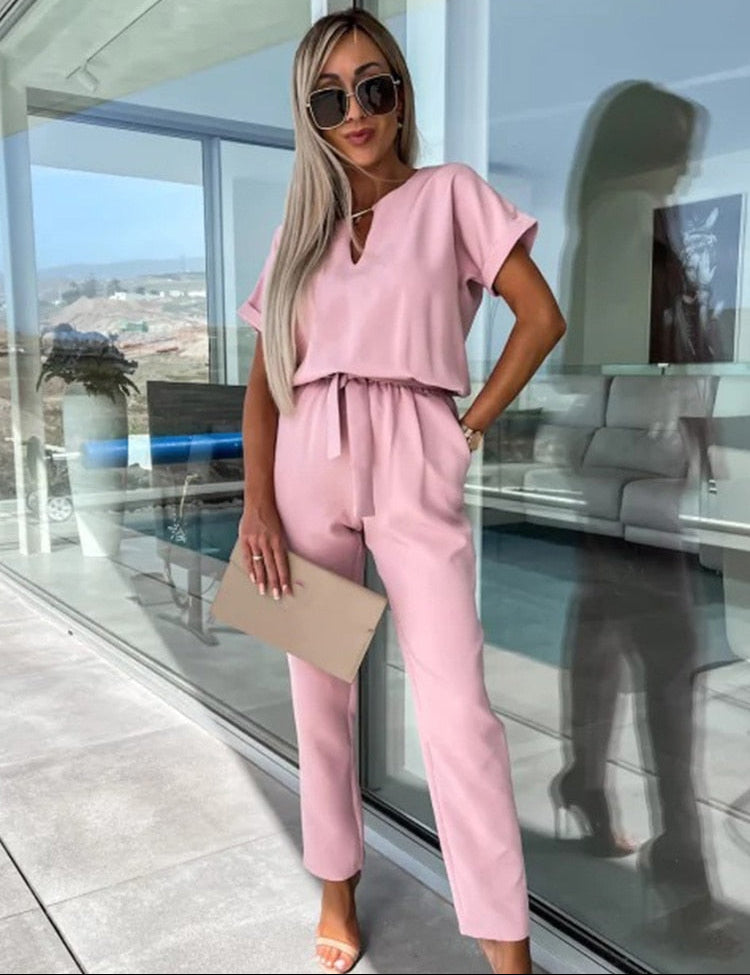 Dames jumpsuit met V-hals ceintuur en korte mouwen