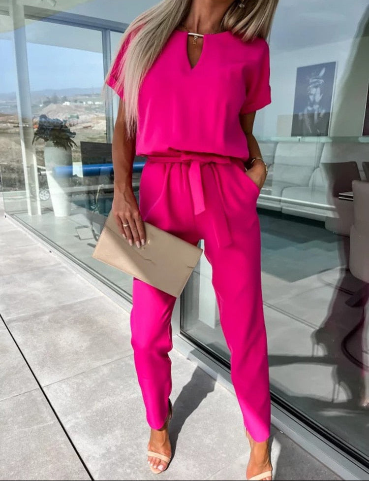 Dames jumpsuit met V-hals ceintuur en korte mouwen