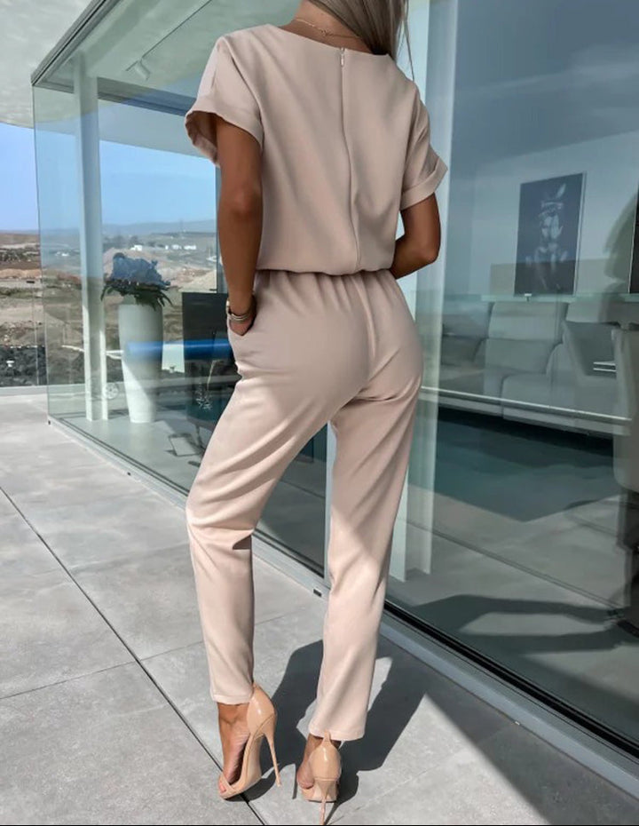 Dames jumpsuit met V-hals ceintuur en korte mouwen